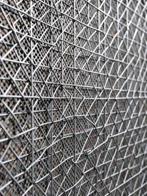Woven wire leaf sculpture in autumn shape, delicate veins, wall mount