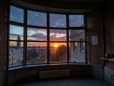 Observatory window reflecting setting sun