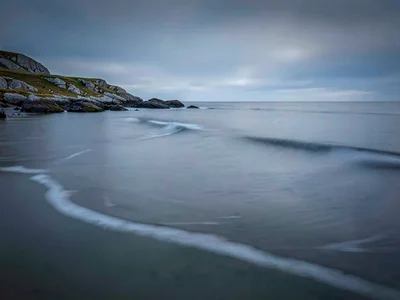 Calm water with subtle current still visible