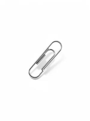 Silver paperclip floating in white void, multiple light sources creating jewelry