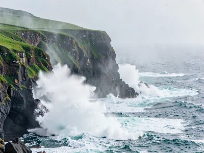 Cliff edge in heavy spray