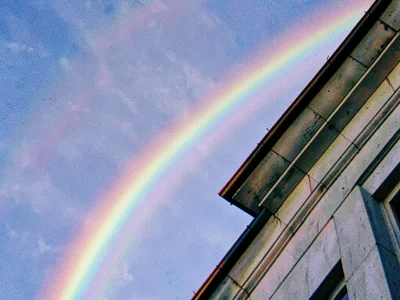 Architecture edge against sky rainbow