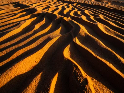 Wind-sculpted snow sastrugi formations, sharp ridges and aerodynamic shapes
