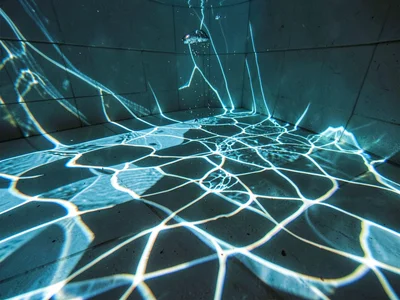 Pool floor dancing with refraction