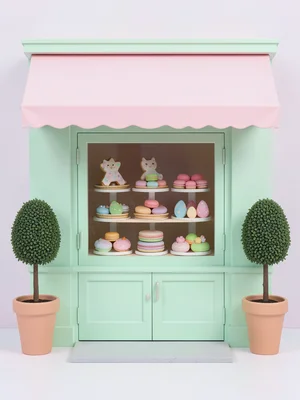 A perfectly symmetrical pastel bakery storefront — mint green facade, pink awnin