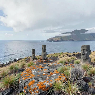 Edge-of-world isolation on Rapa Nui, Grey volcanic stone covered in orange liche