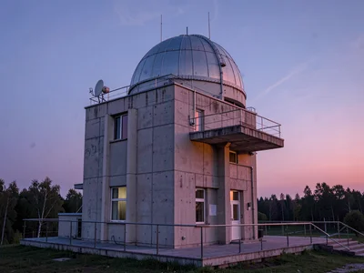 Concrete observatory building catching last pink light