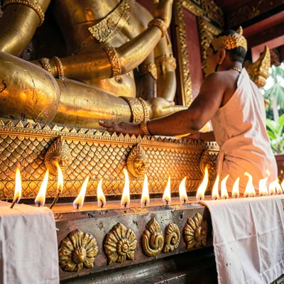 Lanna temple detail, Chiang Mai sacred ornament, candle flames row in front of g