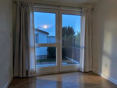 Interior window glow against blue evening