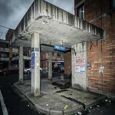 Post-industrial Johannesburg brutalism with harsh flash, Bree Street taxi rank c
