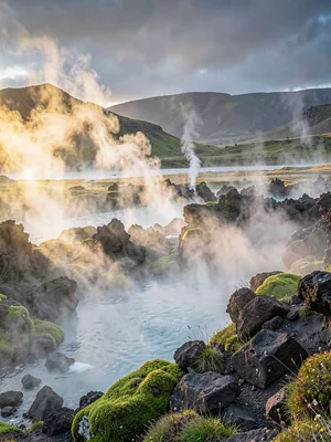 Volcanic otherworldly light in Iceland, steam from a hot spring mixed with cold 