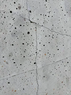 Precast concrete panel texture, perfectly uniform surface from factory mold, sub