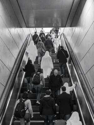 Escalator crowd ghosts