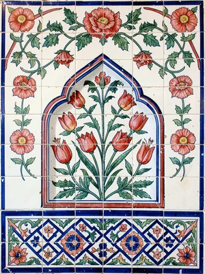 Trefoil-arch prayer niche tile — floral canopy overhead, geometric base panel