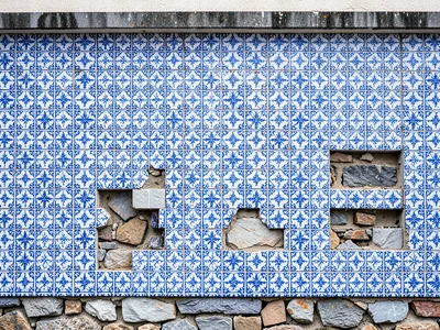 Missing Tile Voids — Stone Substrate Beneath Pattern Field