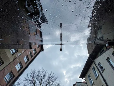 Sky reflected in street after rain
