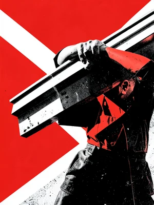 Worker carrying beams over shoulder, dramatic diagonal composition