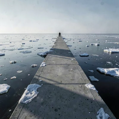 Stark Baltic minimalism, contemplative mood, Long concrete pier extending into f