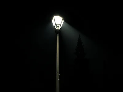 Street lamp creating cone of visibility