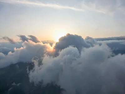 Translucent cloud revealing sun position as diffuse glow