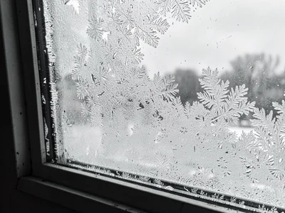 Frost at window corner concentration