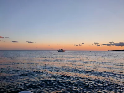 Horizon with dot of boat