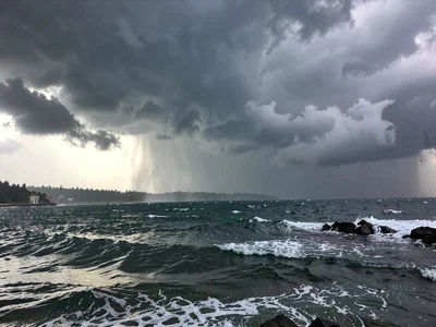 Storm over ocean approaching coast