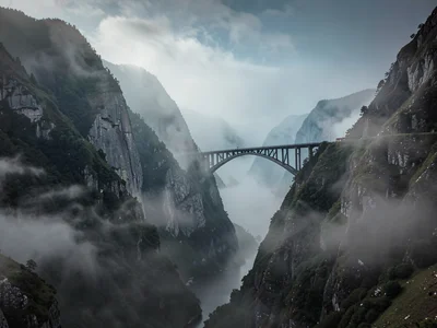 Bridge span connecting ridges through mist