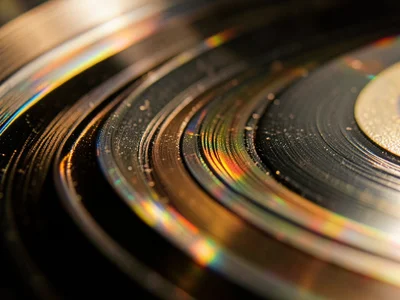 Worn record groove, polished smooth from repeated playback, less modulation visi