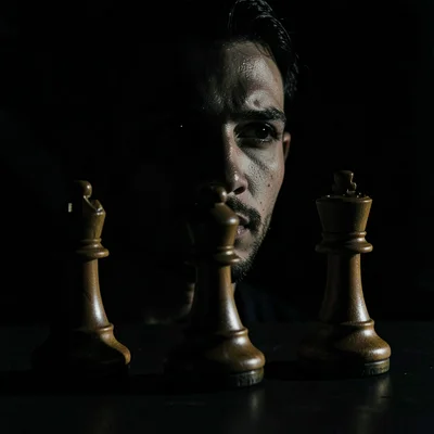 Chess pieces with dramatic side light