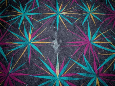 A casino hotel corridor carpet in Las Vegas, explosive maximalist pattern of ove