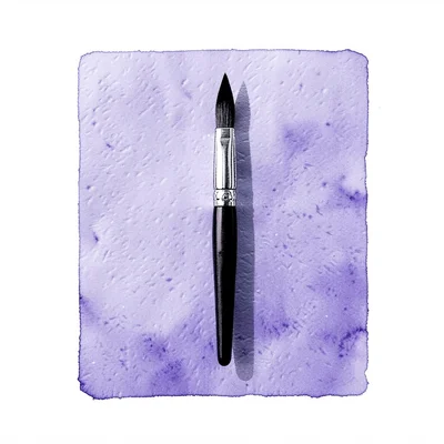 Catalog ad of a single watercolor brush centered on a periwinkle block, hairline