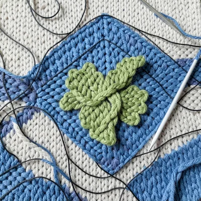 Wool Island — Green Knit Shape in Blue Ocean