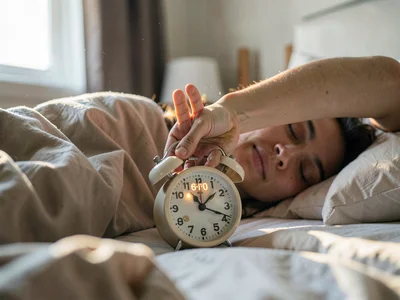 Alarm clock being slapped, the violence of the first conscious act, digital numb