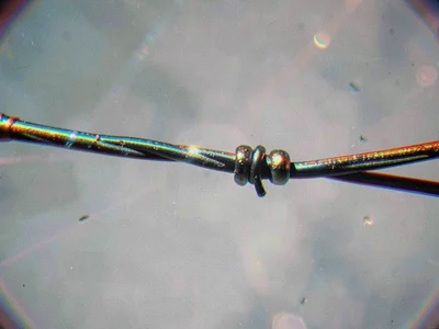 Wire with chromatic aberration visible