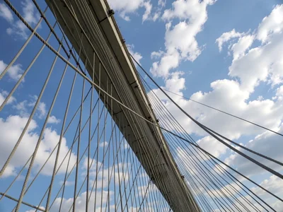 Bridge cables against sky