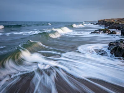Wave energy visible as direction in blur