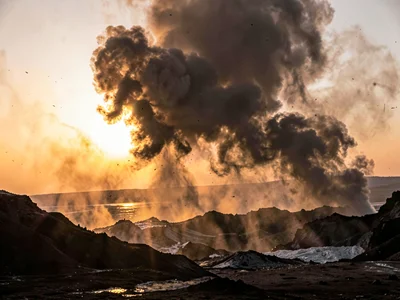 Sunrise through ash-laden atmosphere