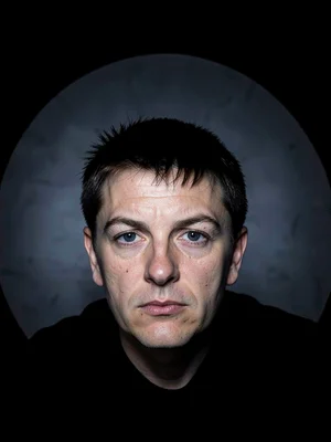 Face at extreme top with forehead and hair completely cut off