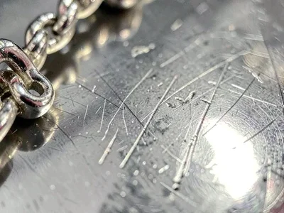 Silver jewelry macro showing marks