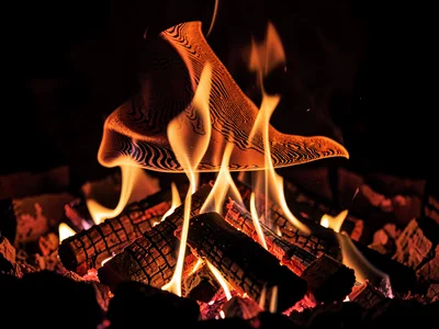 Heat shimmer above fire visible distortion
