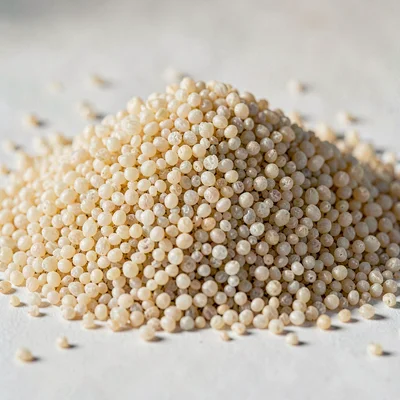 Studio macro of a heap of semolina, individual coarse grains crisp like quartz s