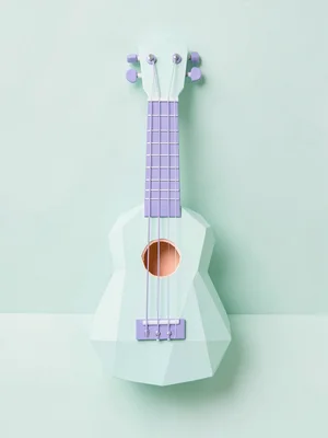 Hawaiian mint lowpoly ukulele with peach soundhole and lavender strings, paper-f
