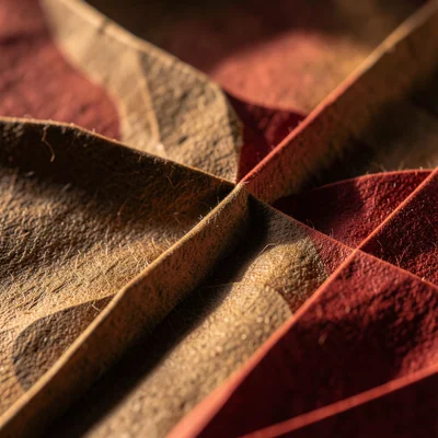 Origami turkey from brown and red paper, table centerpiece, macro detail