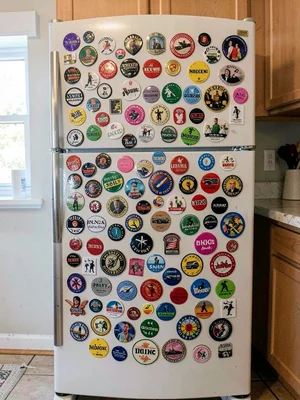 Fridge covered in magnets
