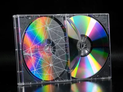 CD case showing compression stress patterns