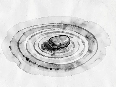 One stone on raked pattern surrounded by nothing