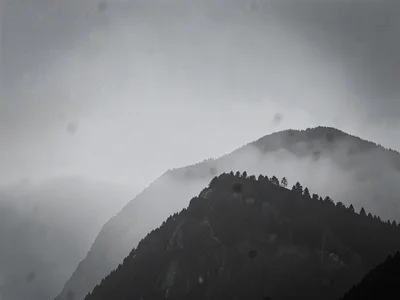Single ridge silhouette against gray gradient