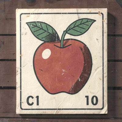 Czech matchbox label illustration, an apple with a single leaf attached , vintag