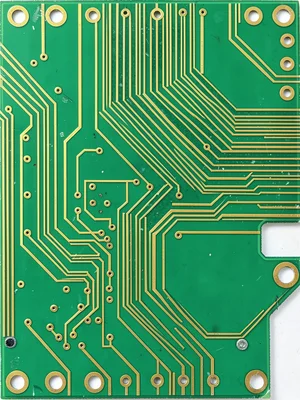 A high-density multilayer PCB edge-on showing the stack of alternating copper an